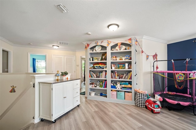 11132 Running Pine Dr, Riverview, FL 33569 - game room with crown molding and light wood-style floors
