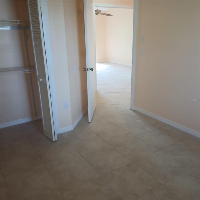7674 37th Street Cir E, Sarasota, FL 34243 - corridor with baseboards