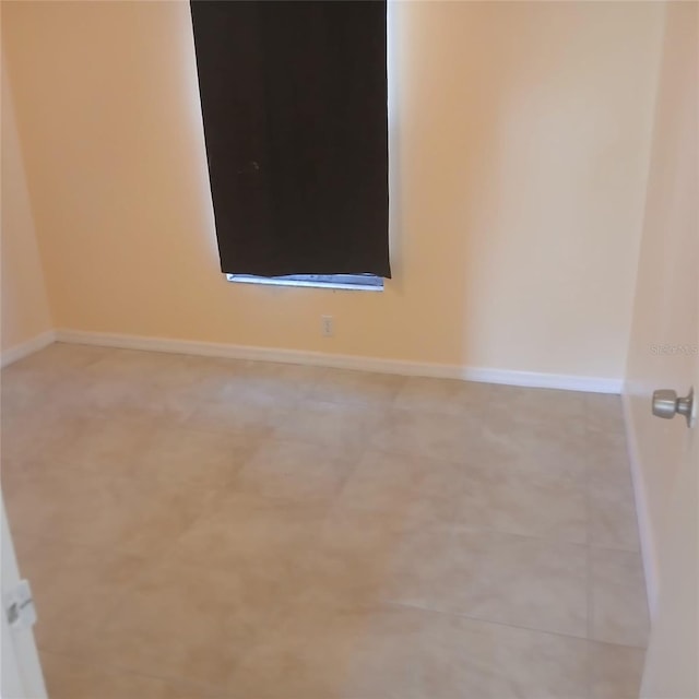 7674 37th Street Cir E, Sarasota, FL 34243 - unfurnished room with baseboards