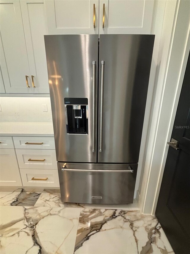 2516 W Abdella St, Tampa, FL 33607 - kitchen view of high end fridge and white cabinetry