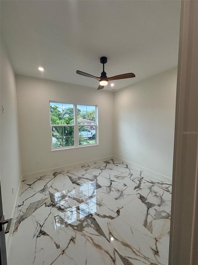 2516 W Abdella St, Tampa, FL 33607 - empty room with marble finish flooring, ceiling fan, and recessed lighting
