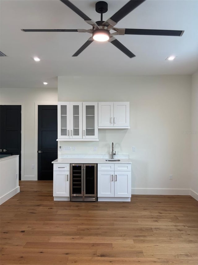 2516 W Abdella St, Tampa, FL 33607 - indoor wet bar with a ceiling fan, recessed lighting, light wood finished floors, and wine cooler
