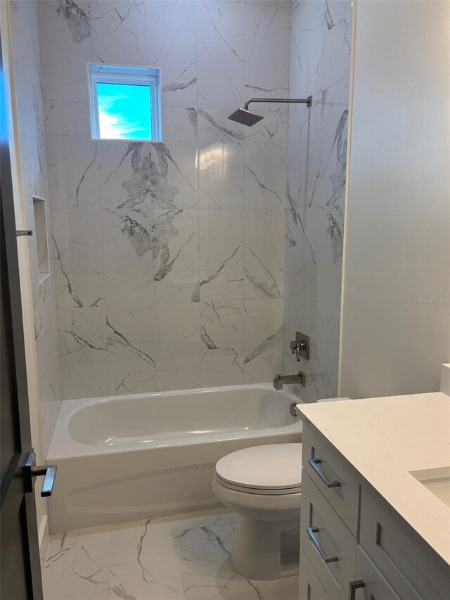 2516 W Abdella St, Tampa, FL 33607 - bathroom featuring vanity, bathtub / shower combination, and marble finish floors