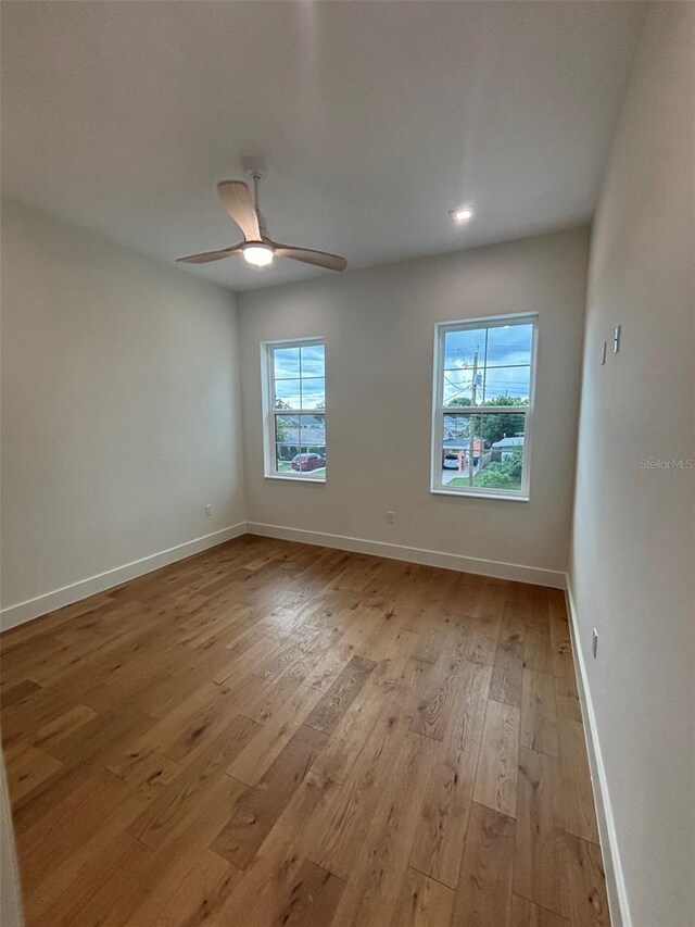 2516 W Abdella St, Tampa, FL 33607 - spare room featuring light wood-style floors, ceiling fan, and recessed lighting