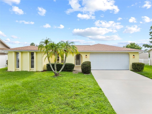 4371 Otter Way, New Port Richey, FL 34653 - single story home with driveway, an attached garage, and stucco siding