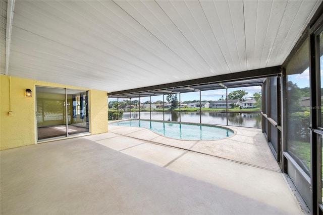4371 Otter Way, New Port Richey, FL 34653 - swimming pool with a patio area and a water view