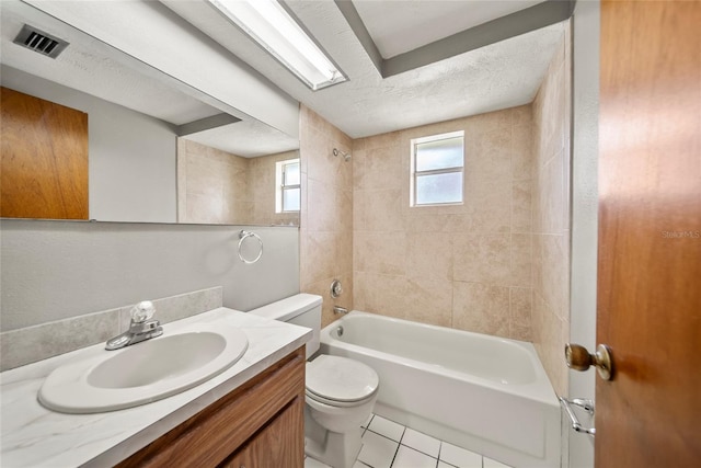 4371 Otter Way, New Port Richey, FL 34653 - full bathroom with vanity, washtub / shower combination, tile patterned flooring, and a textured ceiling