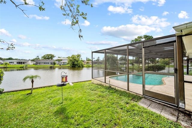 4371 Otter Way, New Port Richey, FL 34653 - outdoor pool featuring a lawn, a water view, a lanai, and a patio area