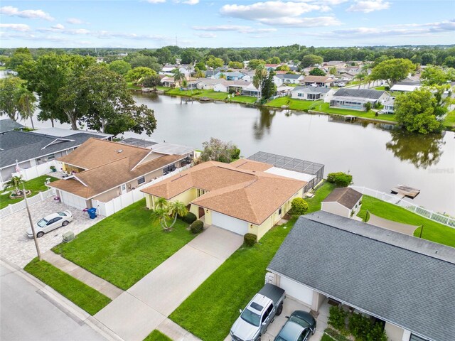 4371 Otter Way, New Port Richey, FL 34653 - aerial perspective of suburban area featuring a nearby body of water