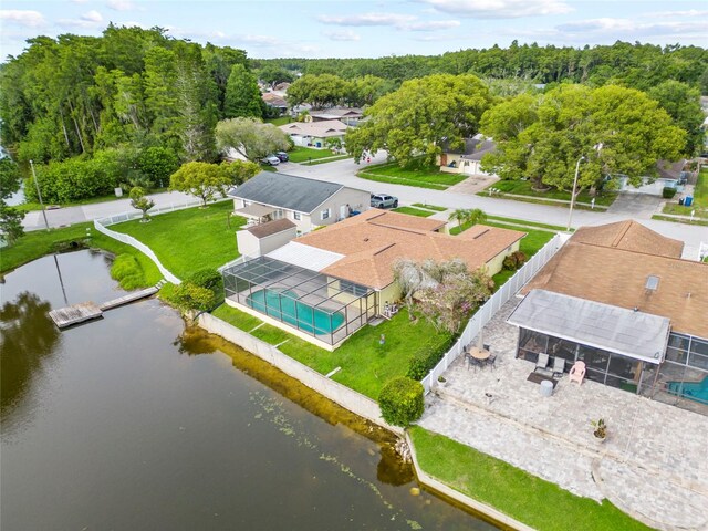 4371 Otter Way, New Port Richey, FL 34653 - aerial perspective of suburban area with a nearby body of water and a pool area