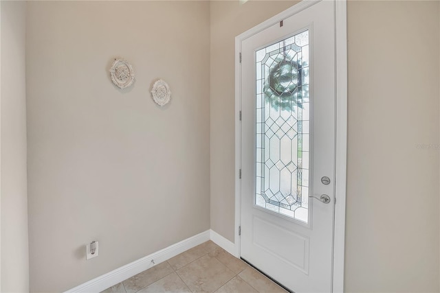 12591 Vander Way, New Port Richey, FL 34654 - entrance foyer featuring baseboards and light tile patterned floors