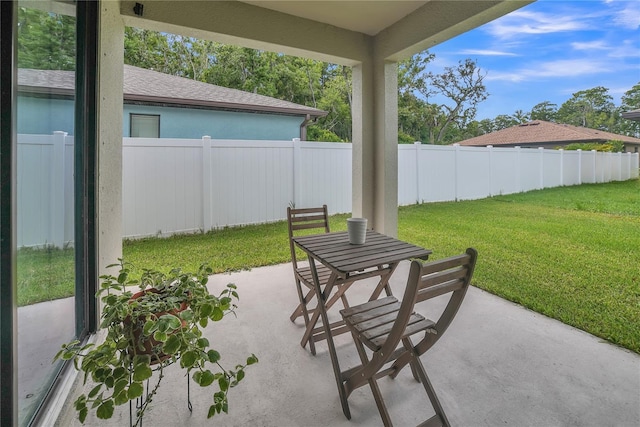 12591 Vander Way, New Port Richey, FL 34654 - fenced backyard with a patio