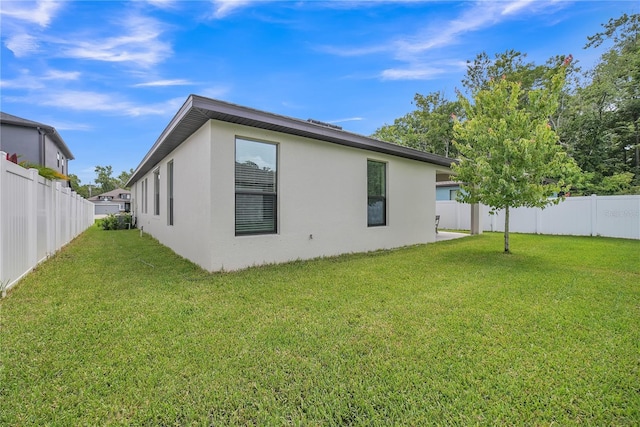 12591 Vander Way, New Port Richey, FL 34654 - back of property with stucco siding