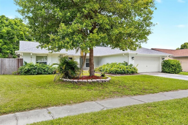 12331 Yellow Rose Cir, Riverview, FL 33569 - view of front of house featuring an attached garage, driveway, and stucco siding