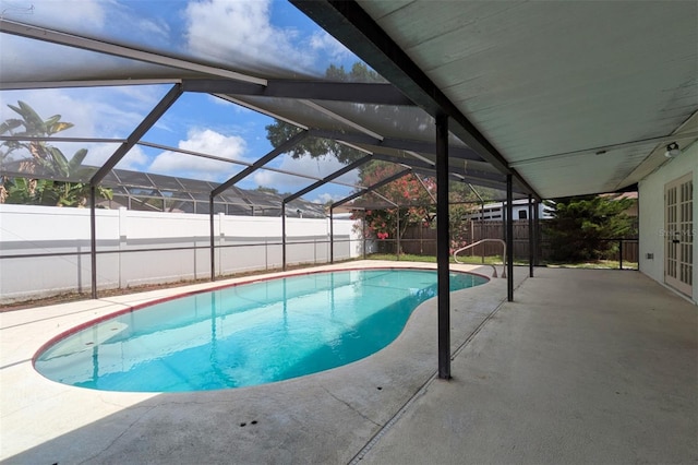 12331 Yellow Rose Cir, Riverview, FL 33569 - view of swimming pool featuring a fenced backyard, a patio, french doors, and glass enclosure