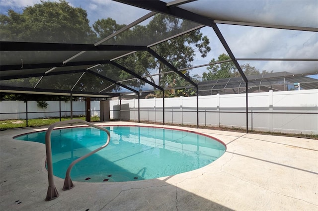 12331 Yellow Rose Cir, Riverview, FL 33569 - view of pool with a fenced backyard, a patio, and a lanai