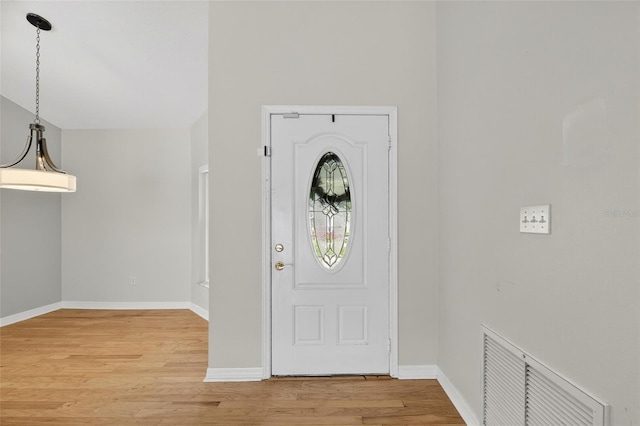 12331 Yellow Rose Cir, Riverview, FL 33569 - foyer entrance featuring baseboards and light wood-type flooring