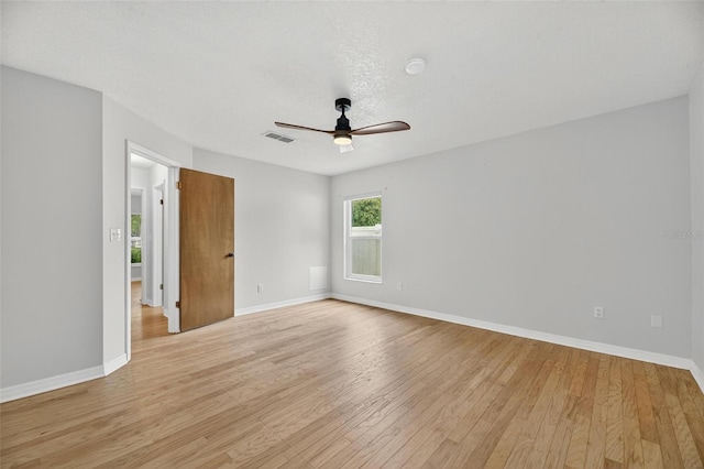 12331 Yellow Rose Cir, Riverview, FL 33569 - unfurnished room featuring ceiling fan, light wood-style flooring, and a smoke detector