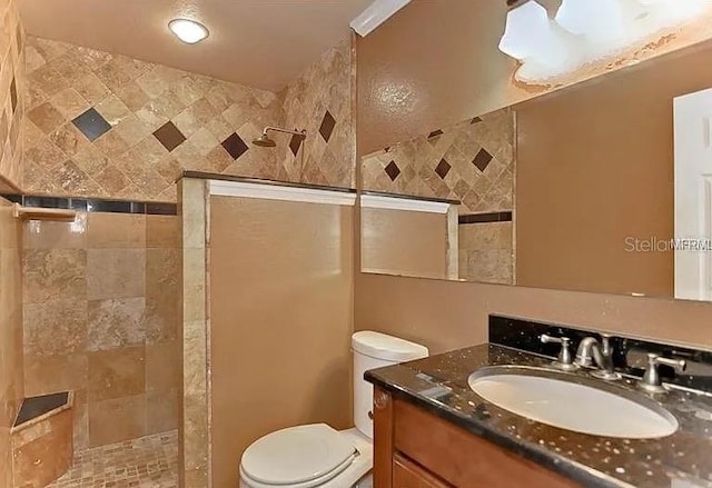 3411 Holland Dr, Brandon, FL 33511 - bathroom featuring a walk in shower and vanity