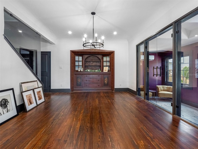 1570 48th Ave N, Saint Petersburg, FL 33703 - entryway with wood-type flooring, a chandelier, recessed lighting, and a wall unit AC