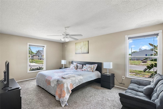 6801 34th Ave W, Bradenton, FL 34209 - carpeted bedroom with ceiling fan and a textured ceiling