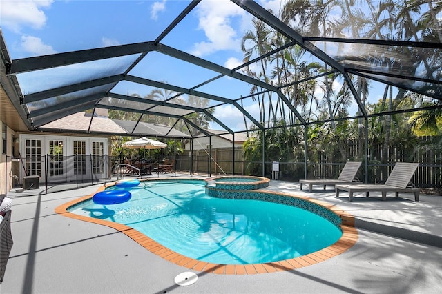 6801 34th Ave W, Bradenton, FL 34209 - view of pool featuring a patio area, french doors, a pool with connected hot tub, and glass enclosure