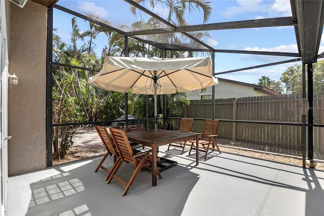 6801 34th Ave W, Bradenton, FL 34209 - view of patio featuring outdoor dining area and a lanai