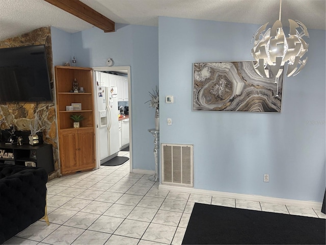 9705 Kingsburgh Ct, Tampa, FL 33615 - dining area featuring a chandelier, light tile patterned floors, and a textured ceiling