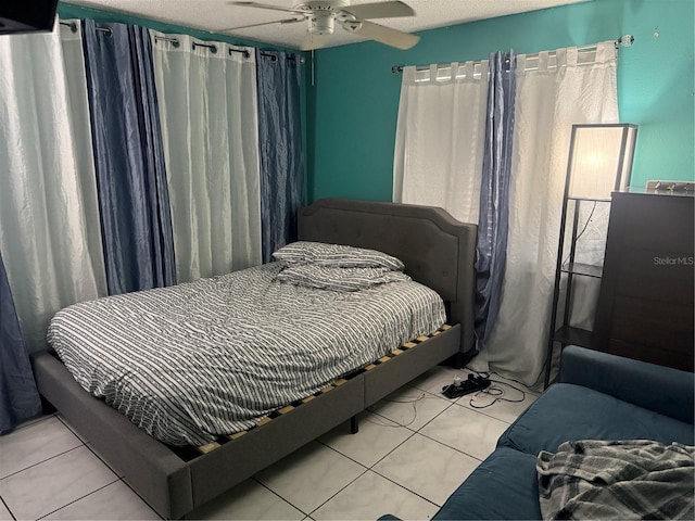 9705 Kingsburgh Ct, Tampa, FL 33615 - tiled bedroom featuring a ceiling fan