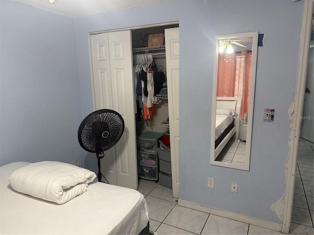 9705 Kingsburgh Ct, Tampa, FL 33615 - bedroom featuring a closet and light tile patterned floors