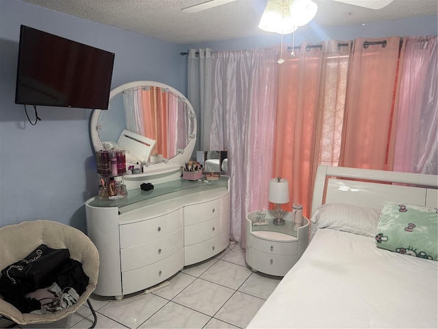 9705 Kingsburgh Ct, Tampa, FL 33615 - bedroom featuring light tile patterned floors, a textured ceiling, and a ceiling fan