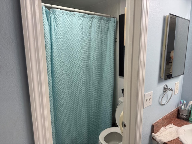 9705 Kingsburgh Ct, Tampa, FL 33615 - bathroom featuring vanity and a shower with curtain