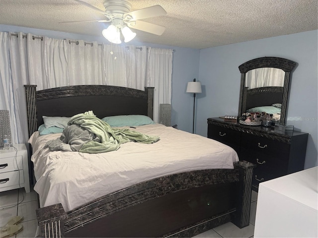 9705 Kingsburgh Ct, Tampa, FL 33615 - bedroom with a textured ceiling, ceiling fan, and tile patterned floors
