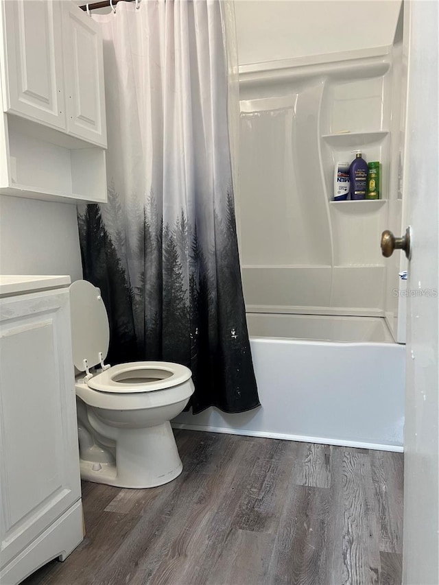 7518 Dolonita Dr Unit 7518, Tampa, FL 33615 - bathroom featuring wood finished floors and shower / bath combination with curtain