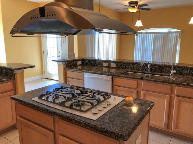 6517 Channelside Dr, New Port Richey, FL 34652 - kitchen featuring island range hood, white appliances, light tile patterned flooring, and a ceiling fan