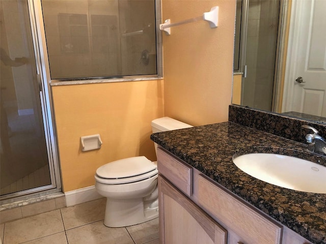6517 Channelside Dr, New Port Richey, FL 34652 - full bath featuring vanity, a shower stall, and tile patterned flooring
