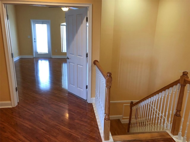 6517 Channelside Dr, New Port Richey, FL 34652 - stairway with wood finished floors and baseboards
