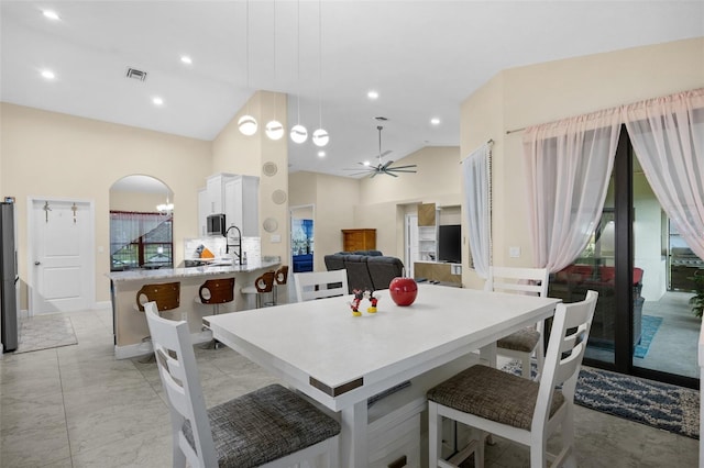13395 59th Ct N, West Palm Beach, FL 33411 - dining room with ceiling fan, arched walkways, recessed lighting, and high vaulted ceiling