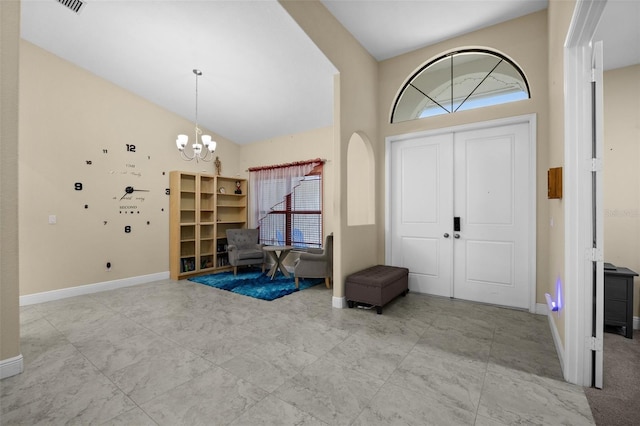 13395 59th Ct N, West Palm Beach, FL 33411 - entrance foyer featuring high vaulted ceiling and a chandelier