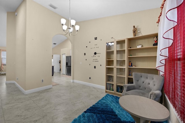 13395 59th Ct N, West Palm Beach, FL 33411 - sitting room with arched walkways and a chandelier