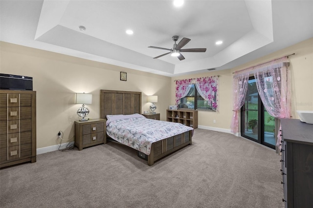 13395 59th Ct N, West Palm Beach, FL 33411 - carpeted bedroom featuring a tray ceiling, access to exterior, ceiling fan, and recessed lighting