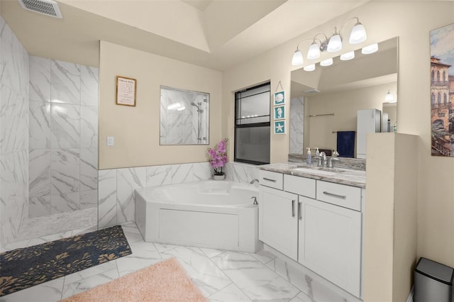 13395 59th Ct N, West Palm Beach, FL 33411 - bathroom with marble look tiles, a garden tub, vanity, and a shower