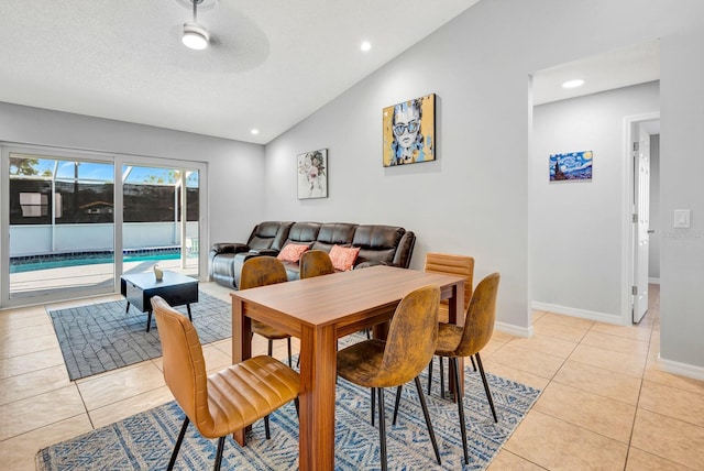 5682 25th Street Cir E, Bradenton, FL 34203 - dining room featuring lofted ceiling, light tile patterned floors, and recessed lighting