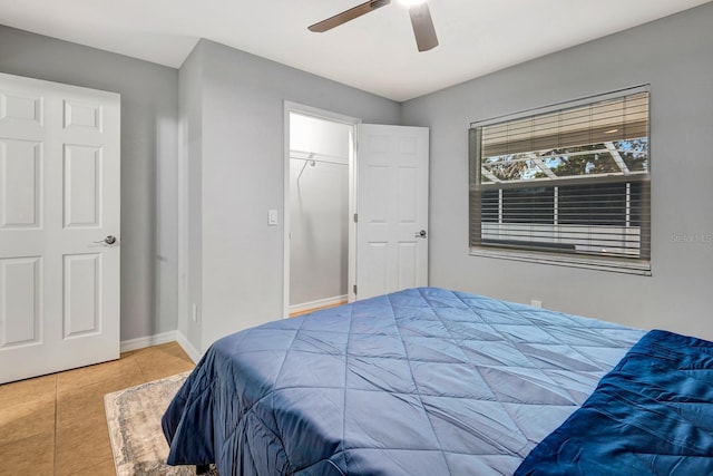 5682 25th Street Cir E, Bradenton, FL 34203 - bedroom with tile patterned floors and a ceiling fan