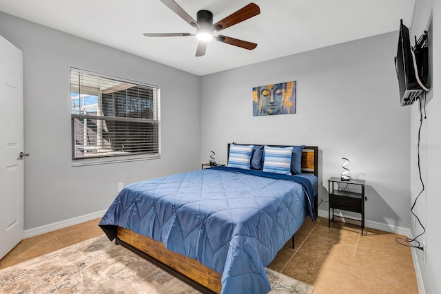 5682 25th Street Cir E, Bradenton, FL 34203 - bedroom with tile patterned floors and a ceiling fan
