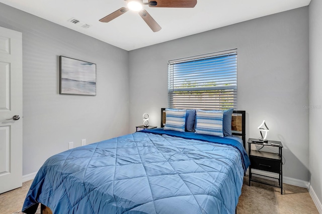 5682 25th Street Cir E, Bradenton, FL 34203 - bedroom with baseboards and ceiling fan