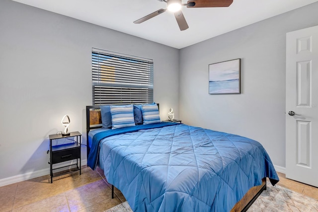5682 25th Street Cir E, Bradenton, FL 34203 - tiled bedroom with baseboards and ceiling fan