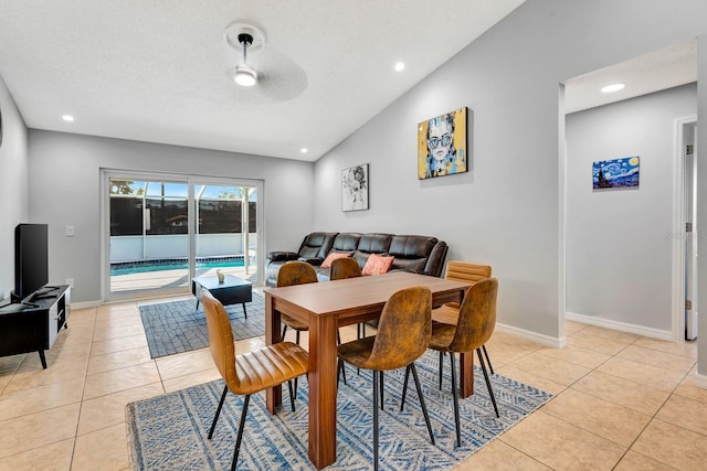 5682 25th Street Cir E, Bradenton, FL 34203 - dining area with light tile patterned floors, lofted ceiling, and recessed lighting