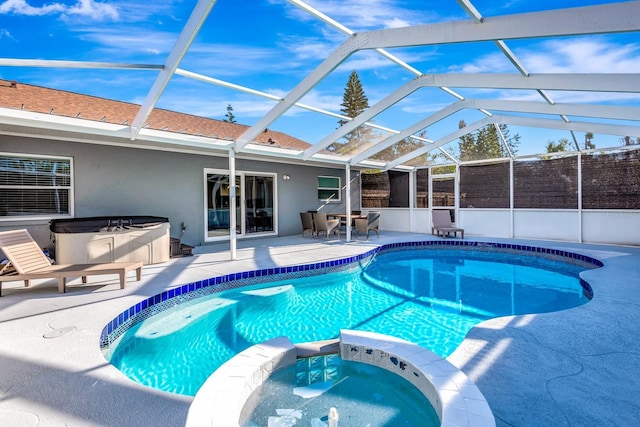 5682 25th Street Cir E, Bradenton, FL 34203 - view of swimming pool with a patio, a lanai, and a pool with connected hot tub