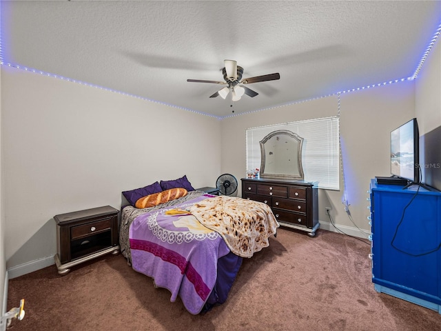 609 W Pipkin Rd, Lakeland, FL 33813 - bedroom featuring carpet, ceiling fan, and a textured ceiling